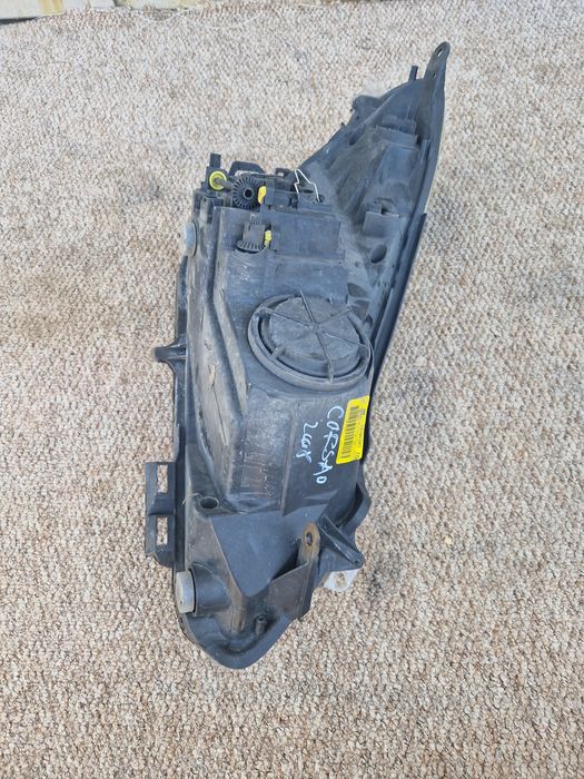 Far stanga Opel Corsa D 2008 cu halogen