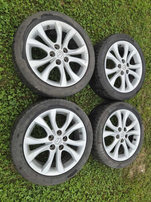 Set 4 jante originale Mazda R17 + anvelope Continental