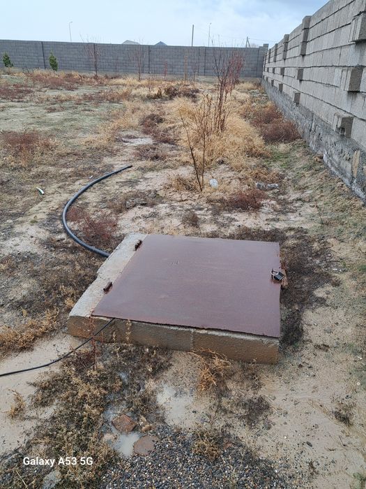 Участок с недостоенным домом