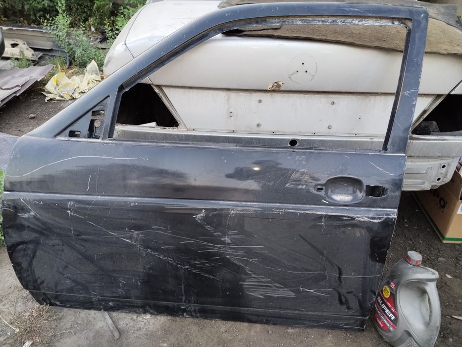 Дверь передние водителя