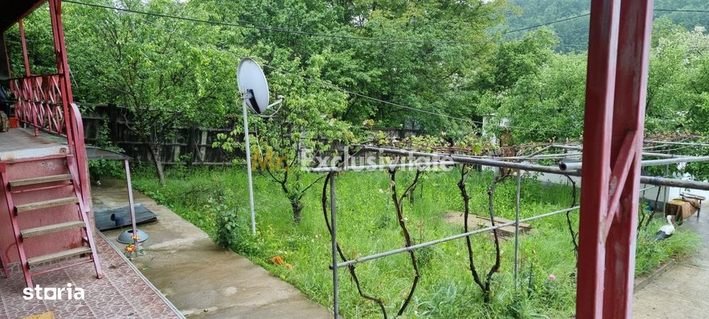 Casă P+M cu 1.558 mp teren, livadă și garaj