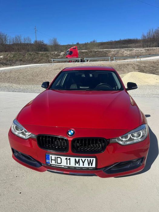 BMW Seria 3 BMW 316i | 2014 | Melbourne Red | Întreținut exemplar | 134.000 km