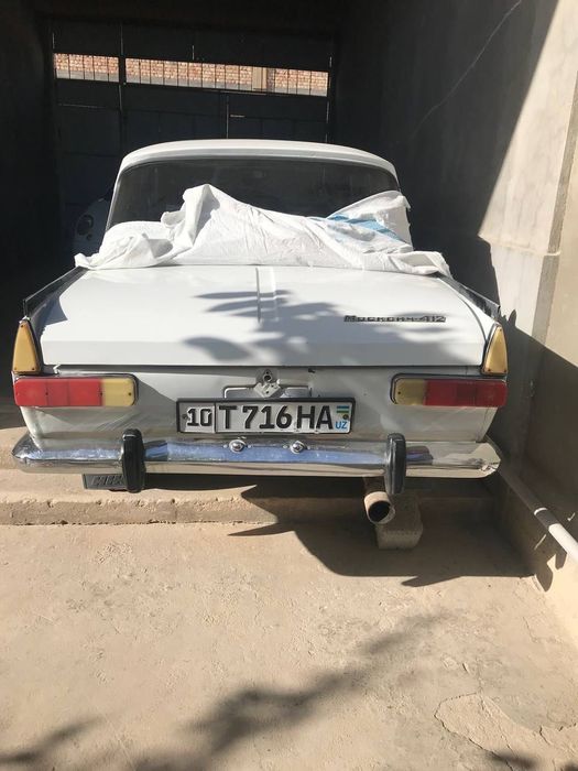 Москвич 412 белого цвета