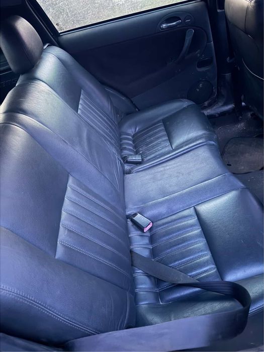 BOSE аудио система, кожени седалки, волан от Alfa Romeo 147