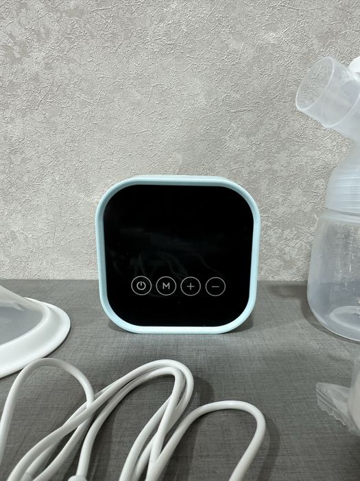 Электрический молокоотсос