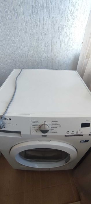 Продавам сушилня с термопомпа AEG Lavatherm, 7 kg, с контейнер за вода.