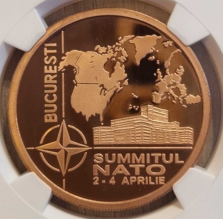 Moneda BNR 1 leu tombac Summitul NATO gradata NGC PF 69 UC