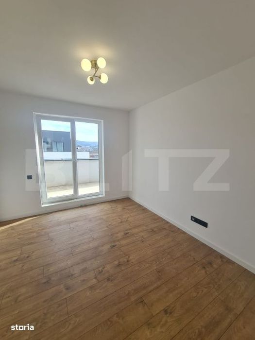Apartament finisat, 52 mp utili, terasa 34 mp, zona Terra