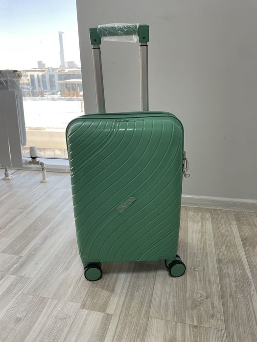 Маленкие новые чемоданы