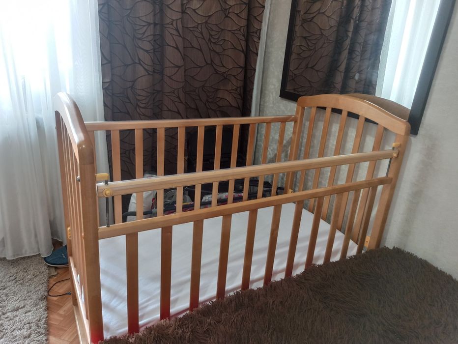 Кроватка с маятником