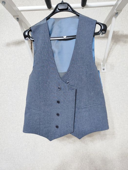 Продам новый костюм