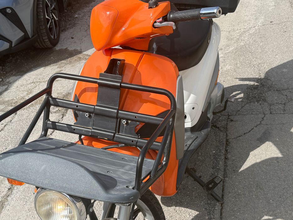 Преводача се скутер ПИАДЖО