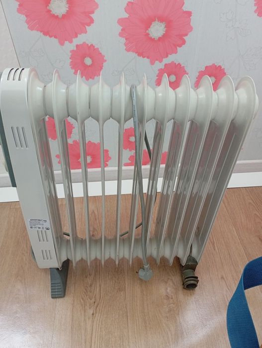 Продам масляный электрообогреватель
