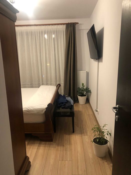 Apartament 2 camere (nou, mobilat) + 2 locuri de parcare (optional)