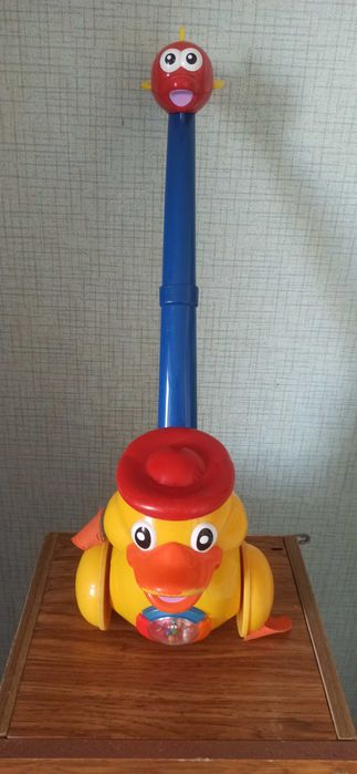 Игрушка - Уточка каталка