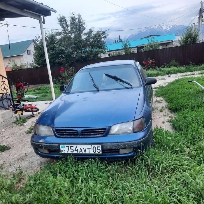 тойота карина е 2