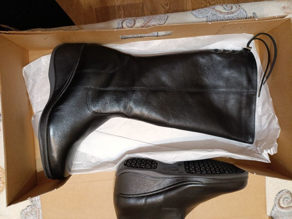 Продам новые  зимние сапоги