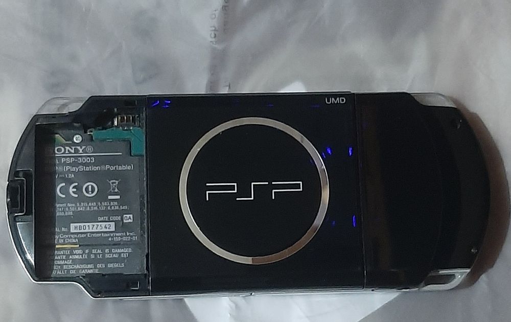 Vand psp în stare bună 3003 cu god of war