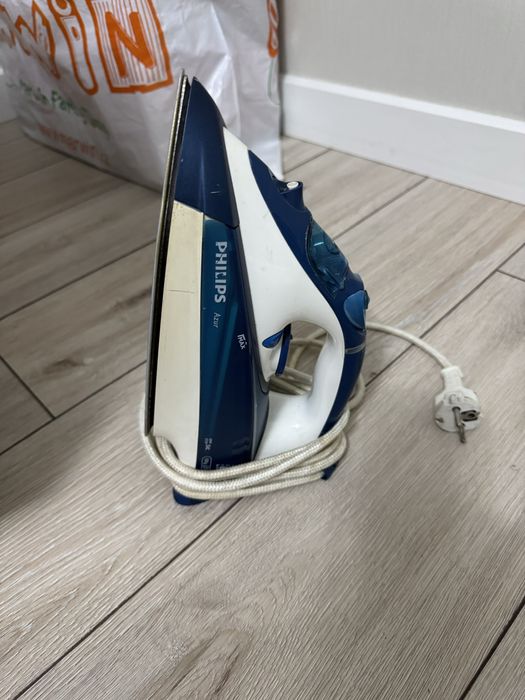 Новый утюг в коробке