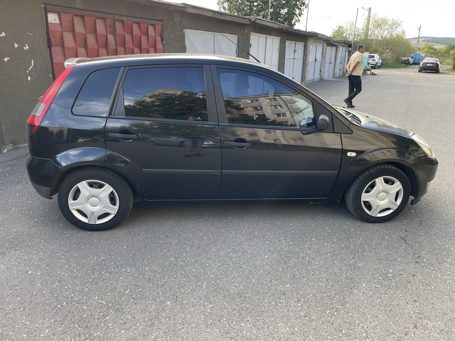 Ford Fiesta 2004  PRET 3299 Lei