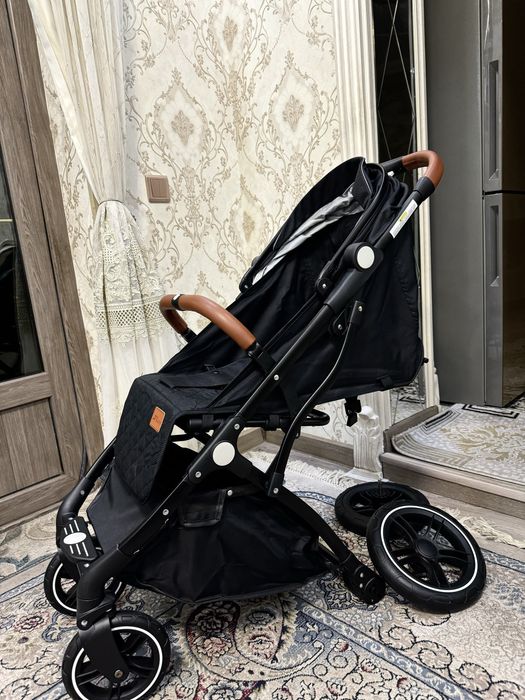 Детская прогулочная коляска