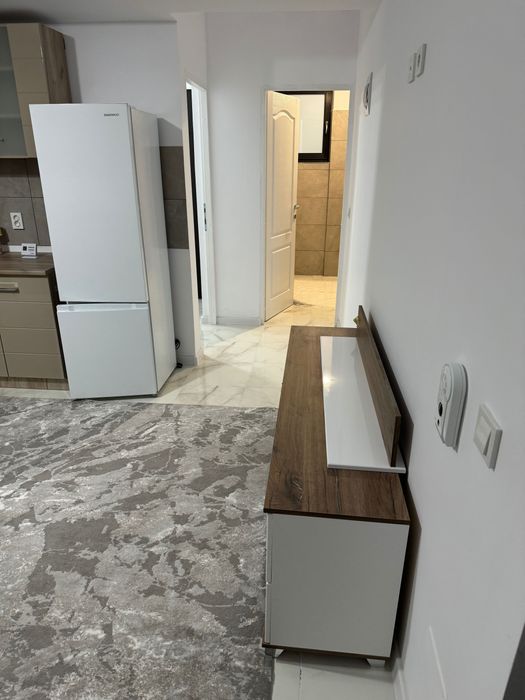 Inchirez apartament cu 2 camere la parter