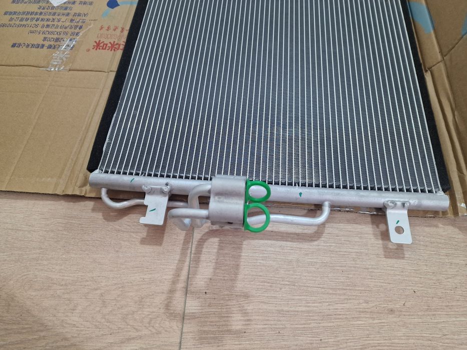 Радиатор охл./конд. Geely Emgrand