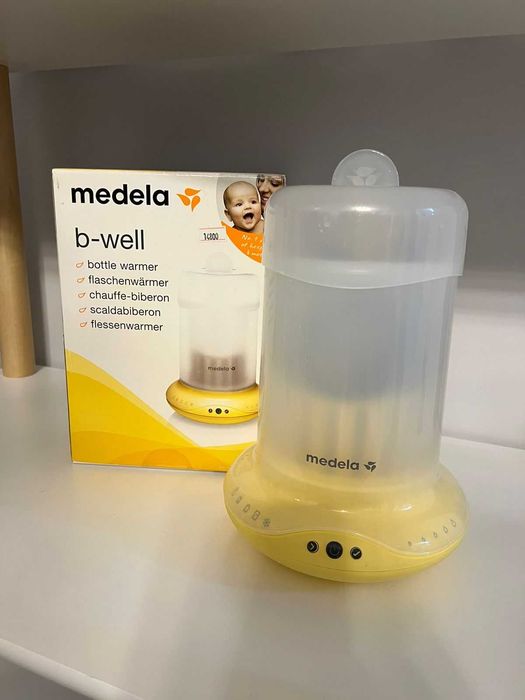 Подогреватель для бутылочек. Medela