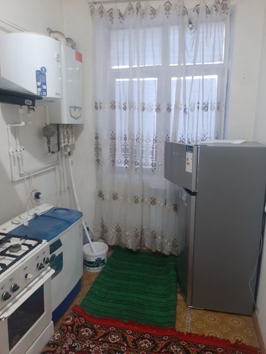 Урганч шаҳар АлХоразими кўчаси, йўл юзида Монро кафе рўпарасида