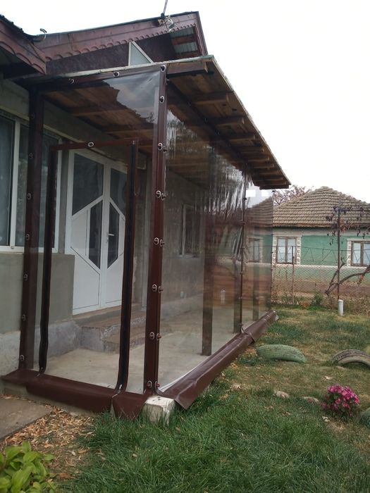 Închideri terase,folie transparentă capse și bride,rulouri cu manivelă