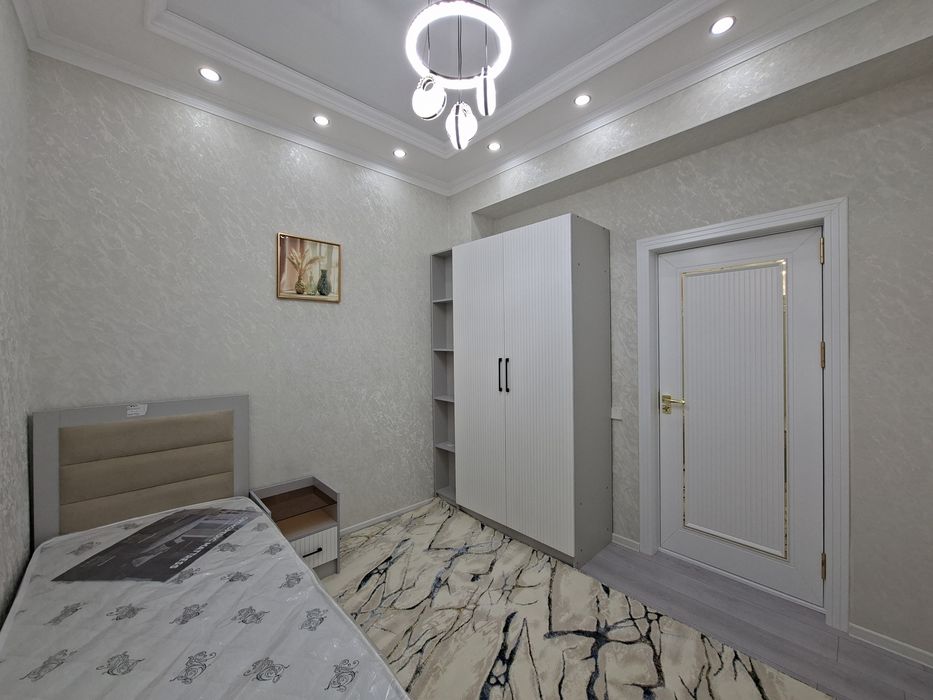 7-poliklinika ro'parasida yo'l ustida