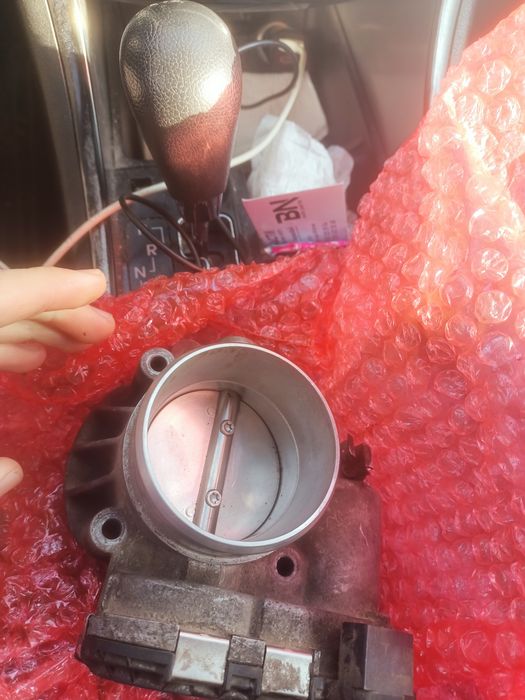 Дроссельная заслонка