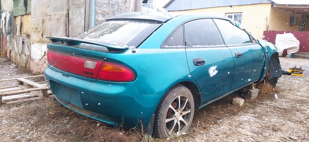 Мазда Mazda 323 95