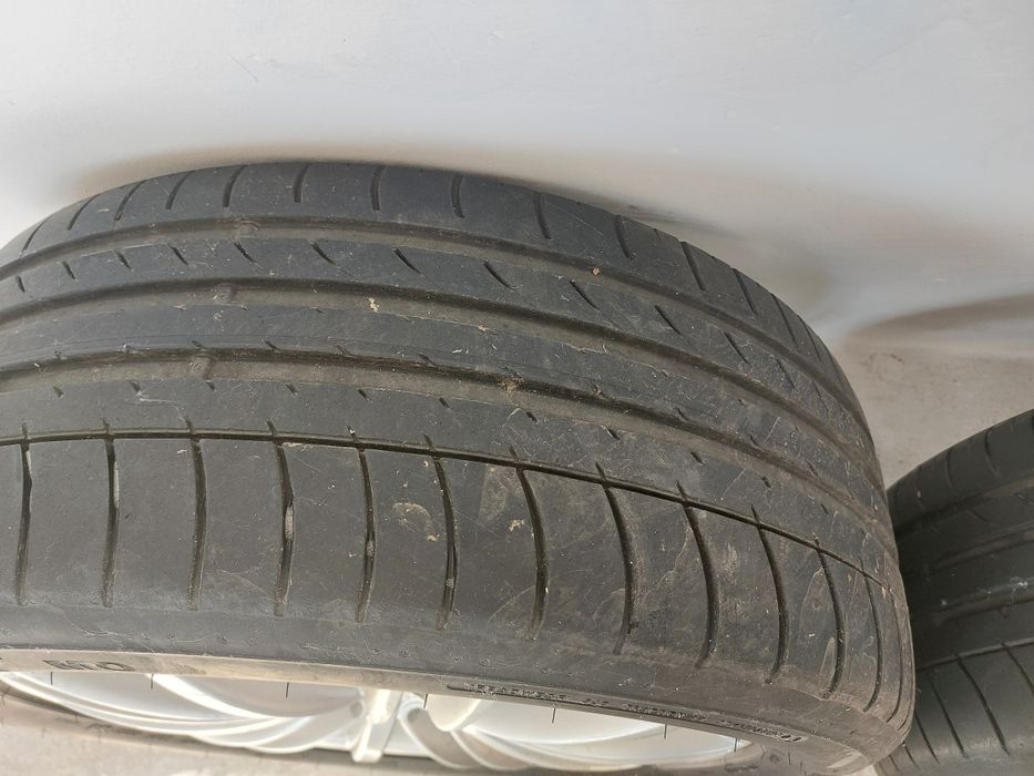 4 jante Volkswagen  aluminiu cu tot cu anvelope  de vara Dunlop