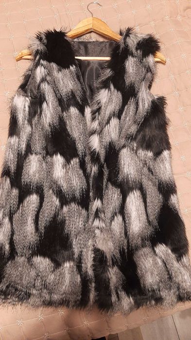 Дамски пухен елек