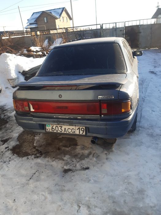 Мазда 323 нексия  москвич