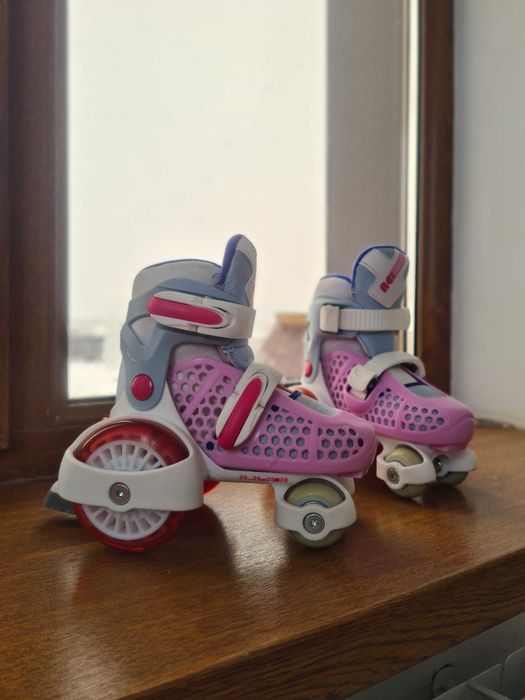 Роликовые коньки