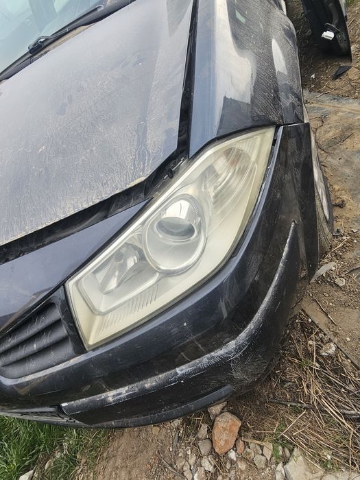 Far stânga dreapta cu lupa Renault megan 2 an 2005