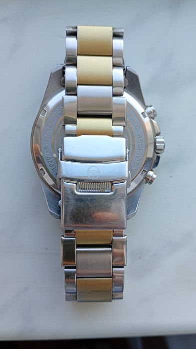 Ceas Sergio Tacchini, negru-auriu, seamănă cu Lorus by Seiko, mecanism japonez, masiv, metalic, greutate 150 grame