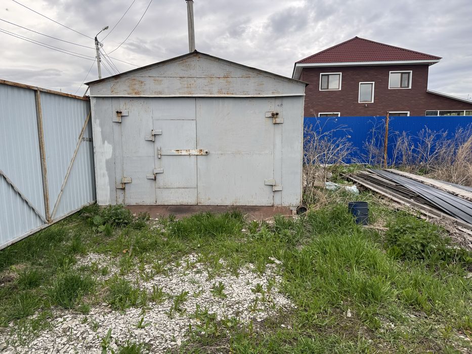 Продам участок с ангаром