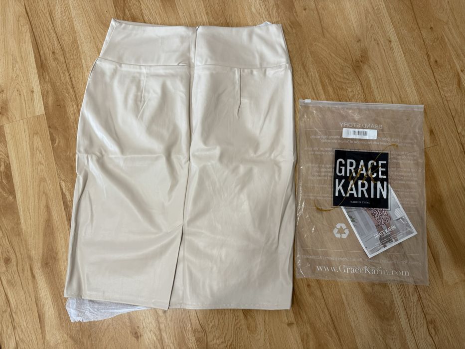 Нова кожена пола цвят много светло бежово