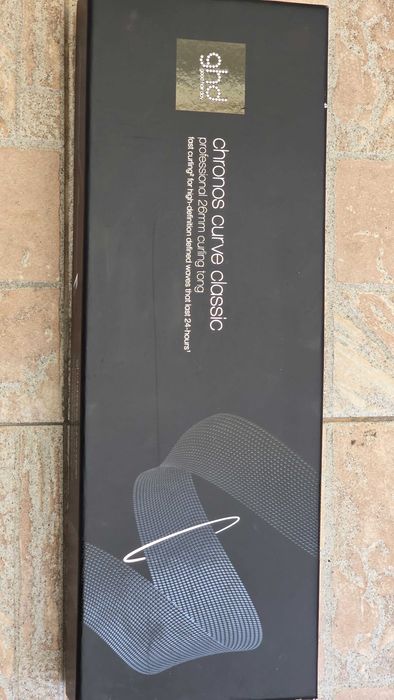 Професионалната маша за коса ghd Chronos Curve Classic Tong (26 мм)