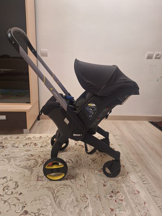 Коляска  DOONA  Б/у