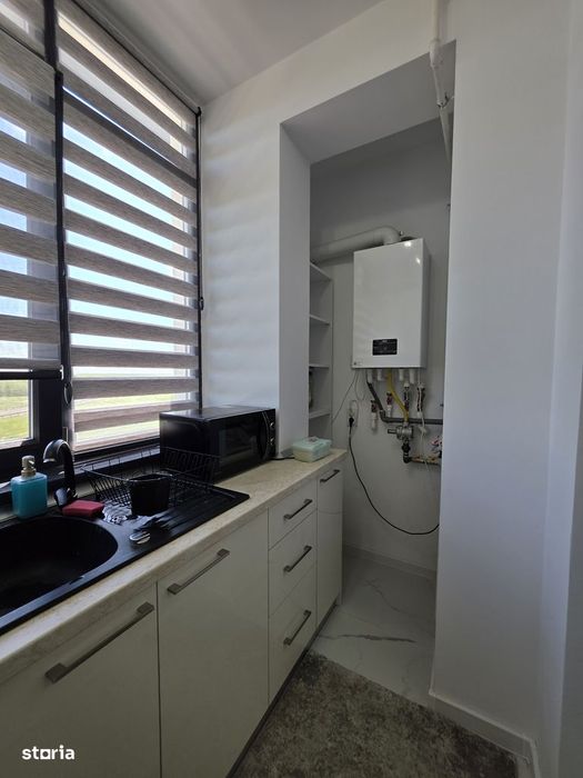 Apartament in bloc nou,mobilat, parcare proprie.