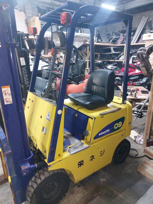 Погрузчик Каматсу 09