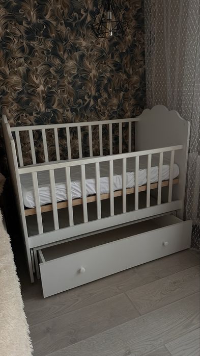 Детская кровать-маятник