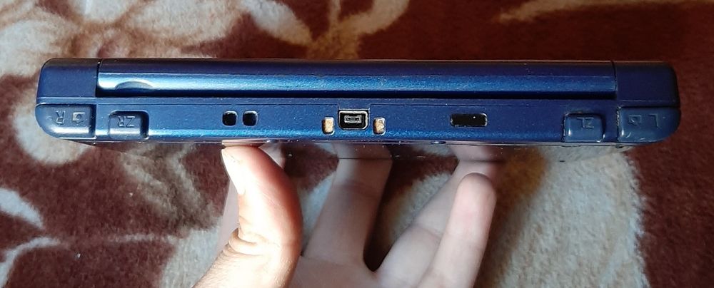 Vând New Nintendo 3ds XL blue în stare bună estetică impecabil