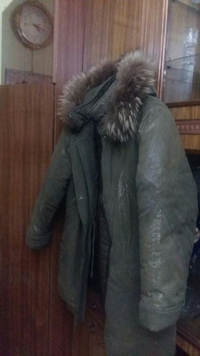Продаю теплую куртку,удлиненную.Цвет хаки.