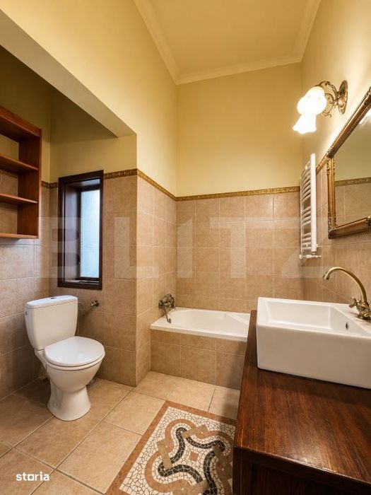 Apartament elegant cu tavane inalte si farmec interbelic — fotografia 3