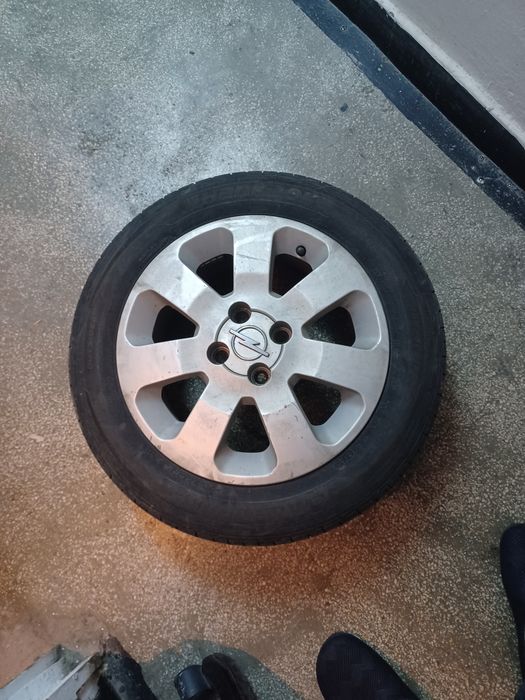 Vând,  jante aliaj Opel  4 x100. cu anvelope  aproape noi 4 bucăți.